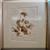 A12. 2 Framed cherub prints. 20”h x 17”w and 20”h x 23”w 